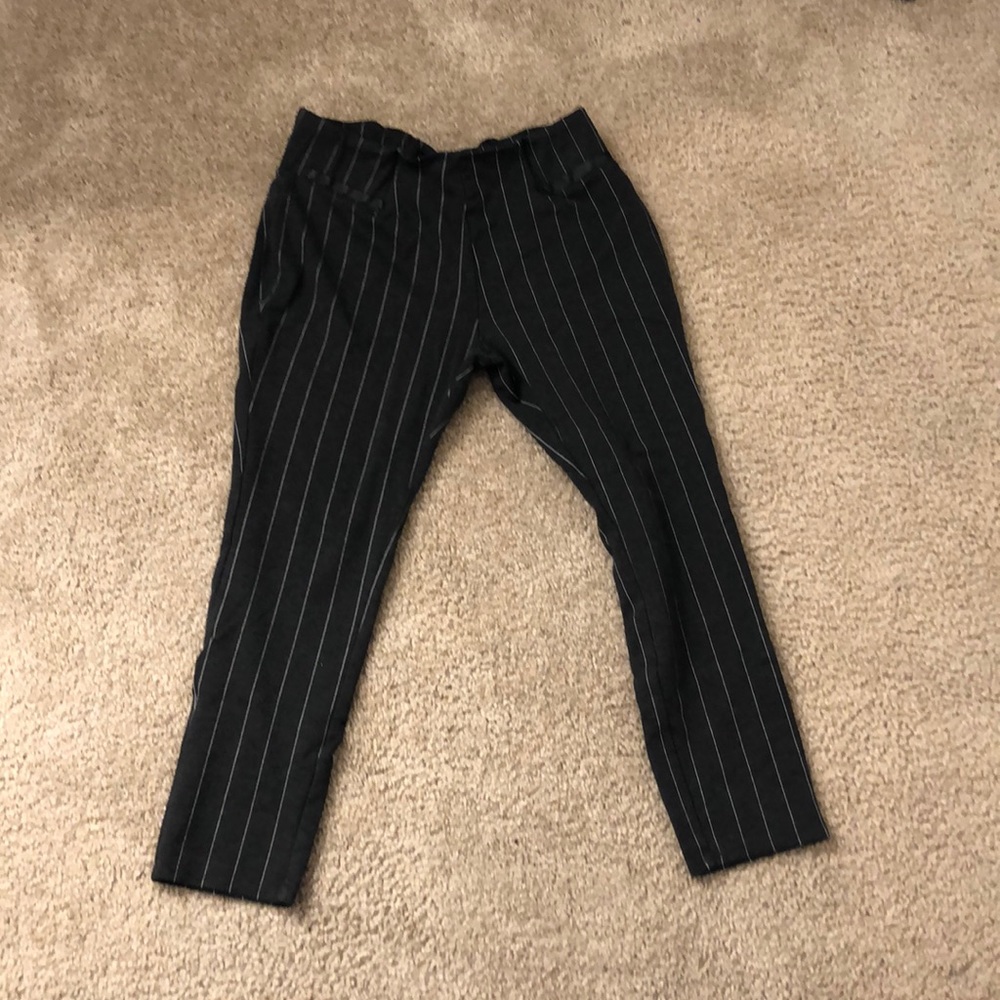 Black pants with white stripes